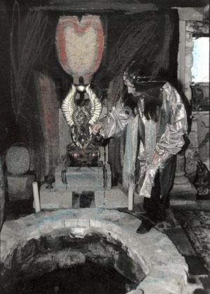 Olivia pouring a libation at Brighid's Well